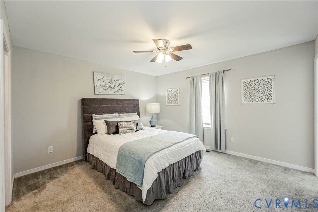 1324 Stone Ridge Park Loop, Henrico, VA 23228 Carpeted interior room featuring light-toned walls, a single window with curtain rods, and a ceiling fan with integrated lighting
