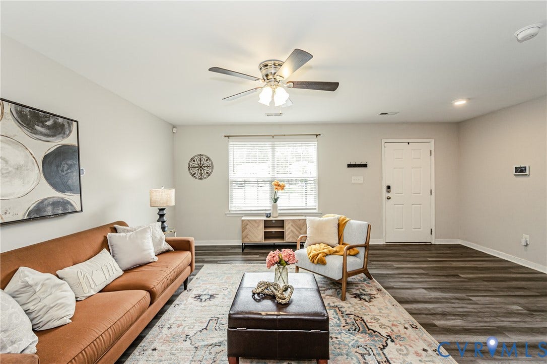 1324 Stone Ridge Park Loop, Henrico, VA 23228 Spacious living area featuring wood-finish flooring, light neutral wall tones, a ceiling fan with integrated lighting, and recessed lighting