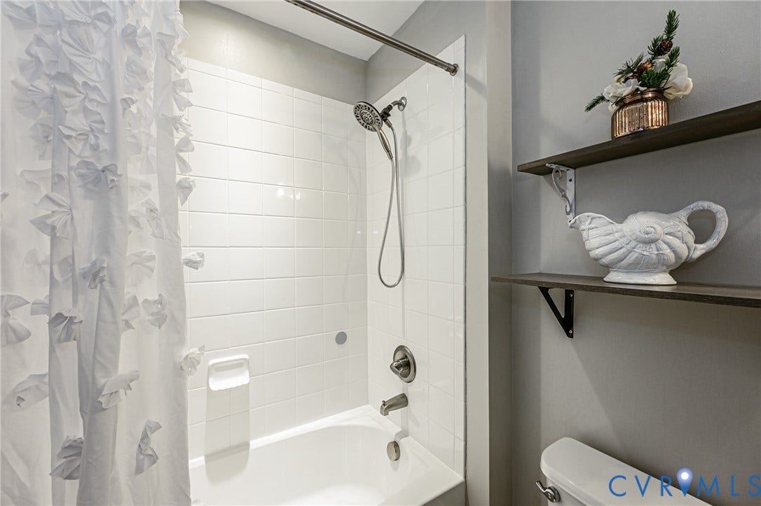 1324 Stone Ridge Park Loop, Henrico, VA 23228 White subway tile surround with brushed nickel fixtures