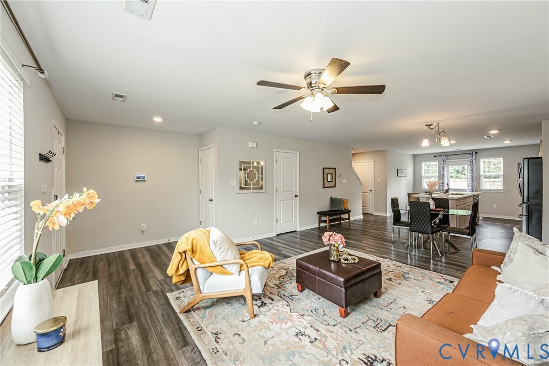 1324 Stone Ridge Park Loop, Henrico, VA 23228 Spacious open-concept living area featuring wood-finish flooring, a ceiling fan, recessed lighting, and white trim