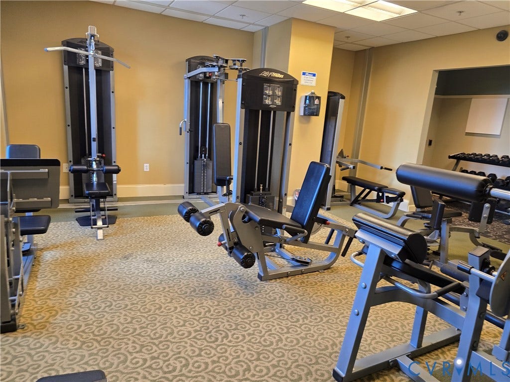 1101 Haxall Point, #815, Richmond, VA 23219 Fitness center featuring multiple weight machines, dedicated free weight area, recessed lighting, and patterned carpeting