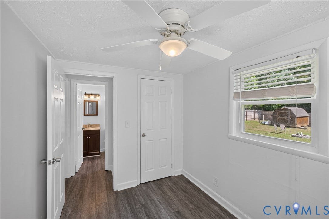 13070 Auburn Mill Road, Glen Allen, VA 23059 Bedroom with wood-finish flooring, a ceiling fan with integrated lighting, and a window featuring horizontal blinds