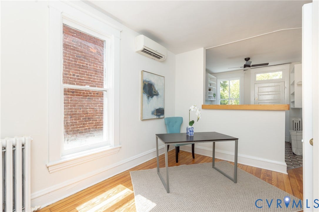 3135 Floyd Avenue, Museum District, Richmond, VA 23221 Hardwood flooring throughout featuring white trim and baseboards