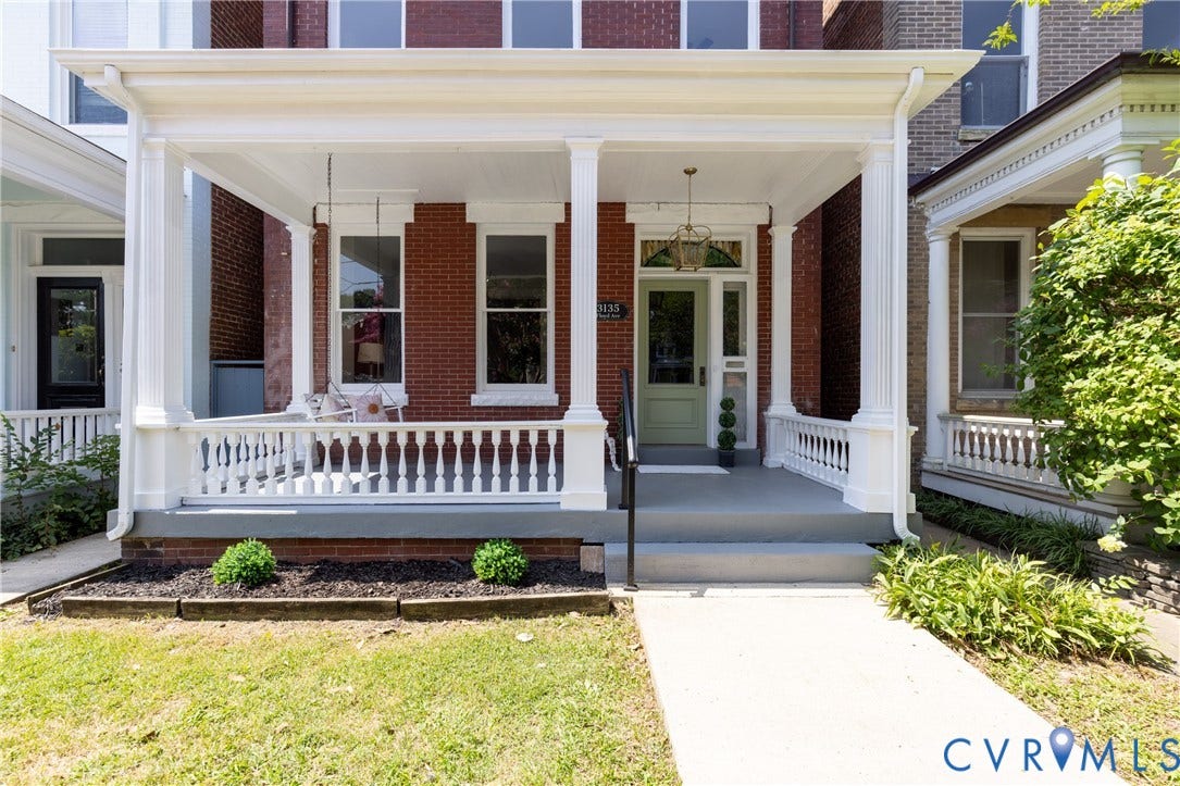 3135 Floyd Avenue, Museum District, Richmond, VA 23221 Brick facade residence featuring a covered porch with white columns and balustrade