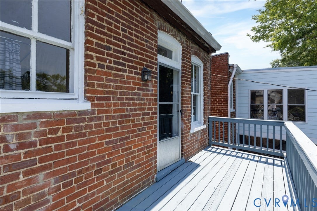 3135 Floyd Avenue, Museum District, Richmond, VA 23221 Outdoor deck featuring wood railing and painted wood flooring