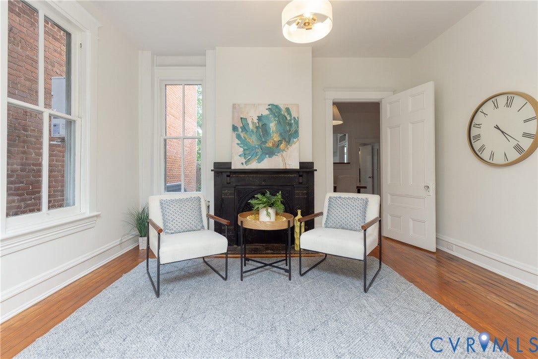 3135 Floyd Avenue, Museum District, Richmond, VA 23221 Hardwood flooring throughout featuring a decorative fireplace with an ornate mantel