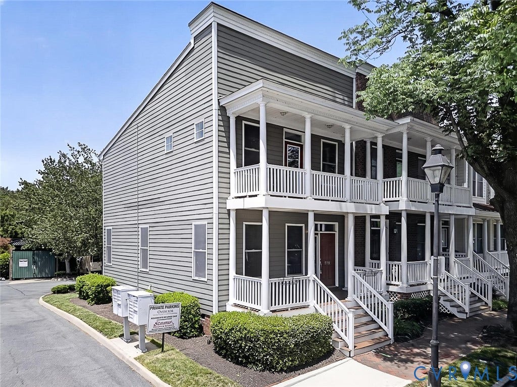710 S Laurel Street, Oregon Hill, Richmond, VA 23220 Multi-level townhouse-style property featuring a side-gabled roofline and horizontal siding