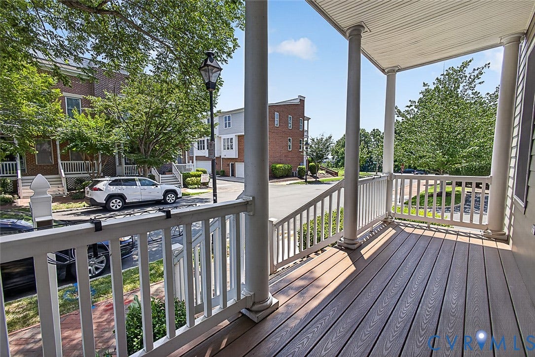 710 S Laurel Street, Oregon Hill, Richmond, VA 23220 Spacious covered porch with composite decking, white railing, and decorative columns