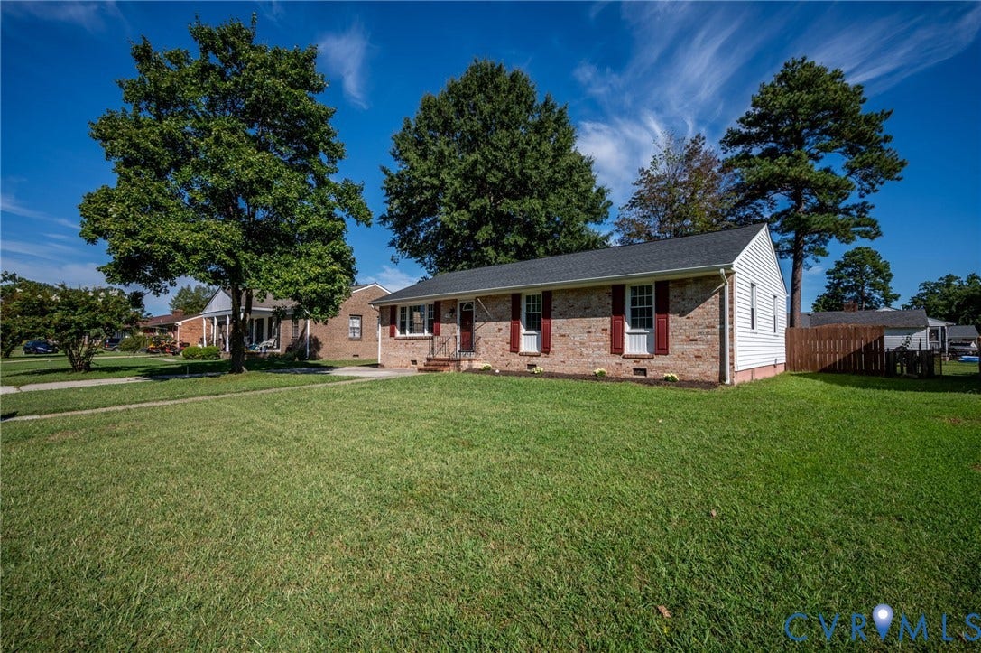 912 Williamsburg Road, Colonial Manor, Colonial Heights, VA 23834 Brick and siding exterior with a dark shingle roof