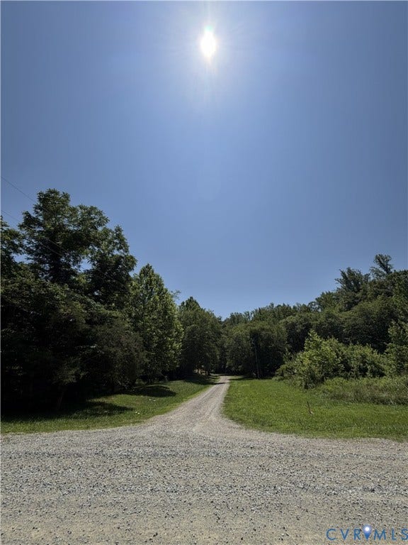 Entrance to driveway pictured from Parrish Rd