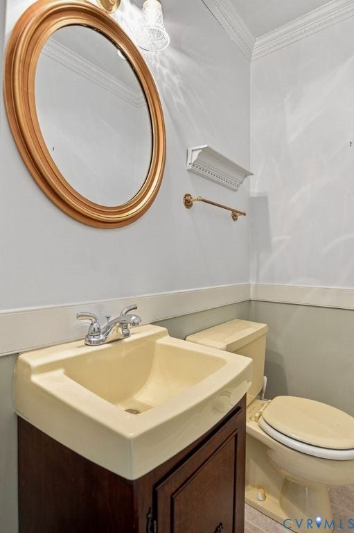 2425 Chancellor Road, North Chesterfield, VA 23235 Main floor half bathroom. Vanity with an integrated beige sink, chrome faucet, and a wood-finish cabinet