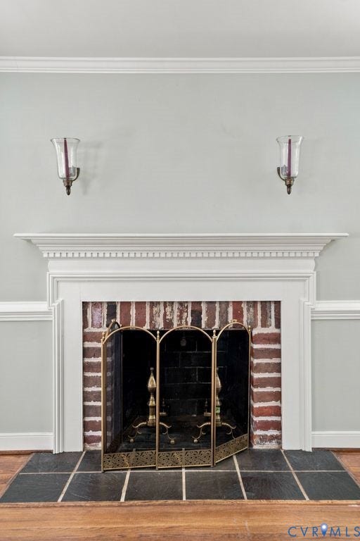 2425 Chancellor Road, North Chesterfield, VA 23235 Fireplace featuring a brick surround, white mantel, and stone-tile hearth