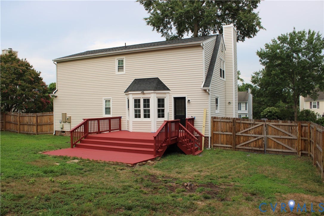 2120 Oakhampton Place, Henrico, VA 23233 Rear exterior featuring a red multi-level deck and a screened door entry