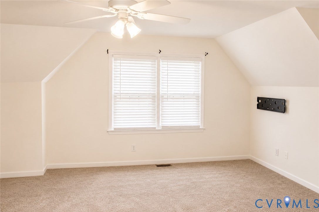 2120 Oakhampton Place, Henrico, VA 23233 Carpeted room with a ceiling fan, sloped ceilings, and a window with blinds