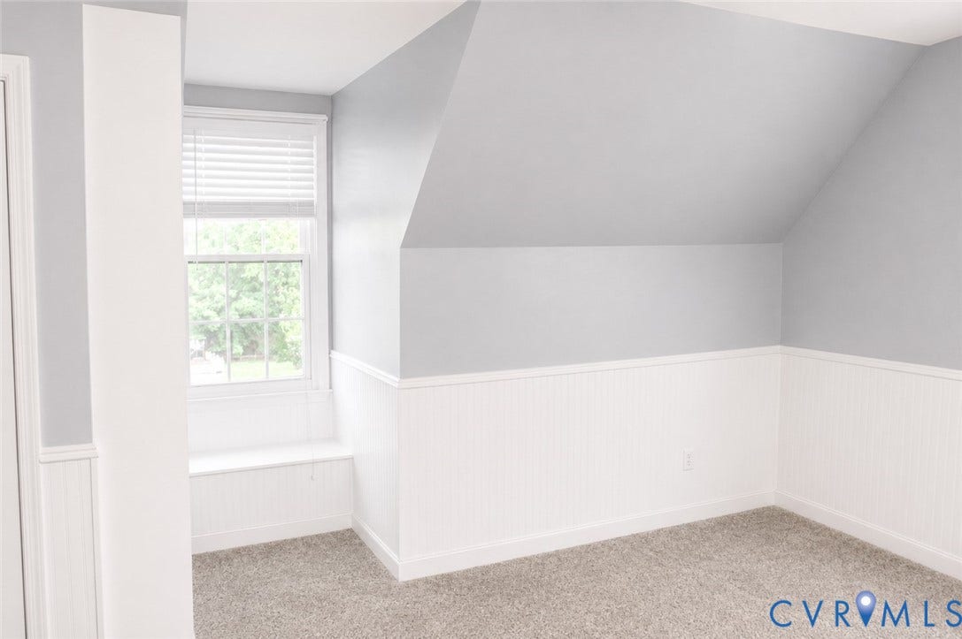 2120 Oakhampton Place, Henrico, VA 23233 Room featuring gray wall paint, white wainscoting, and a window with a built-in bench seat