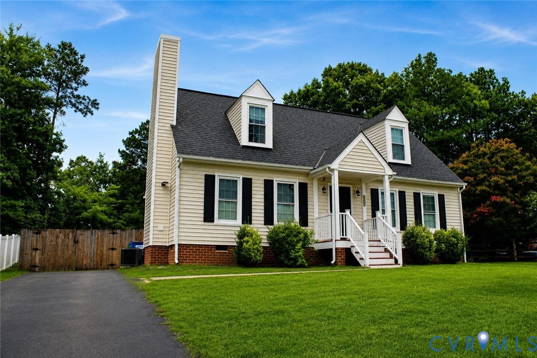 2120 Oakhampton Place, Henrico, VA 23233 Classic Cape Cod residence featuring light-colored siding and a dark shingled roof