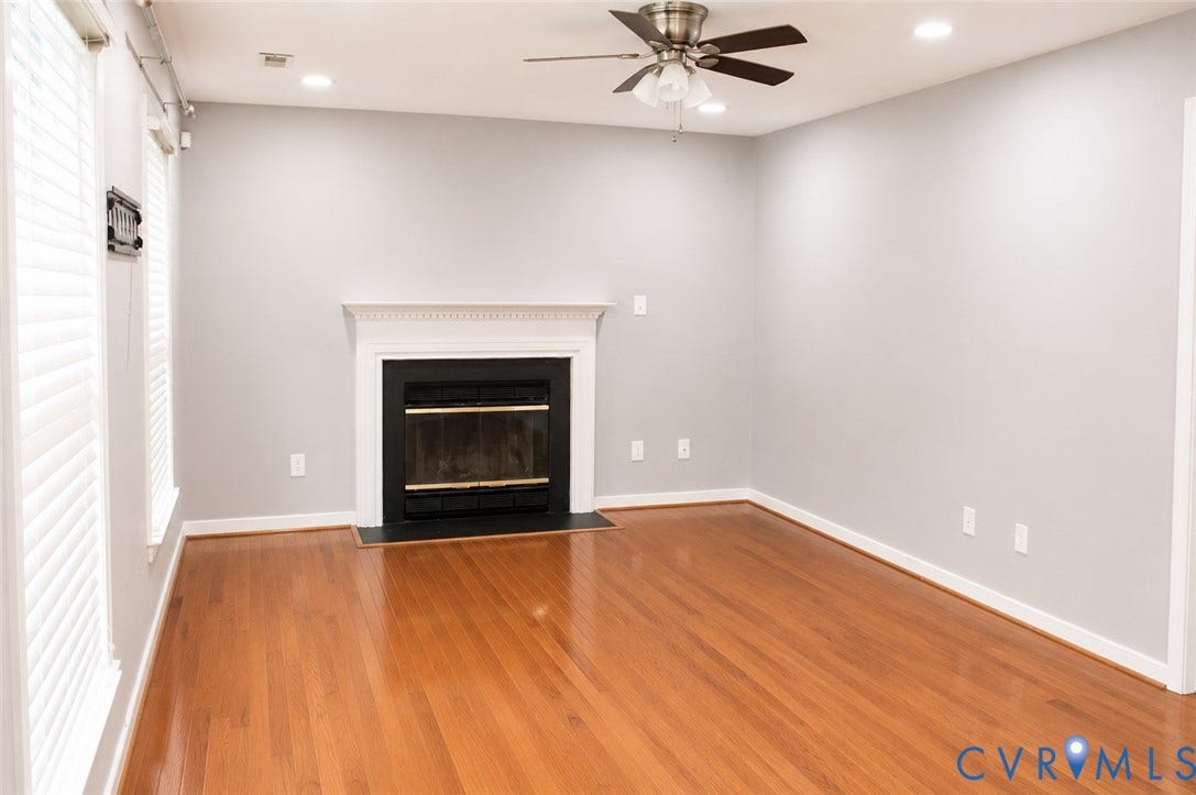 2120 Oakhampton Place, Henrico, VA 23233 Living area featuring wood-finish flooring, a fireplace with a white mantel, recessed lighting, a ceiling fan, and window blinds