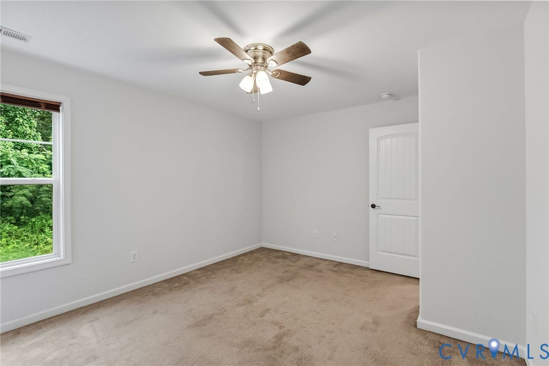 2007 Arcadia Avenue, Chester, VA 23831 Carpeted room with a ceiling fan light fixture, white interior walls, and white trim