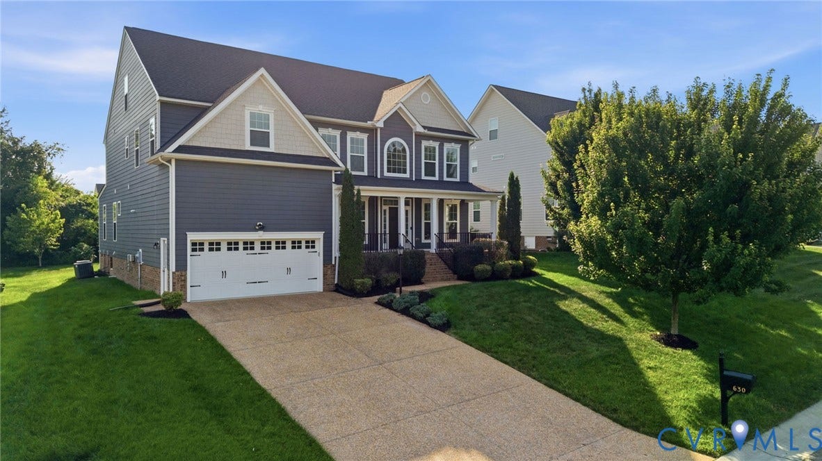 630 Arbor Press Court, Alden Parke, Henrico, VA 23059 Two-story residence featuring a dark gray siding facade and complementary light siding accents