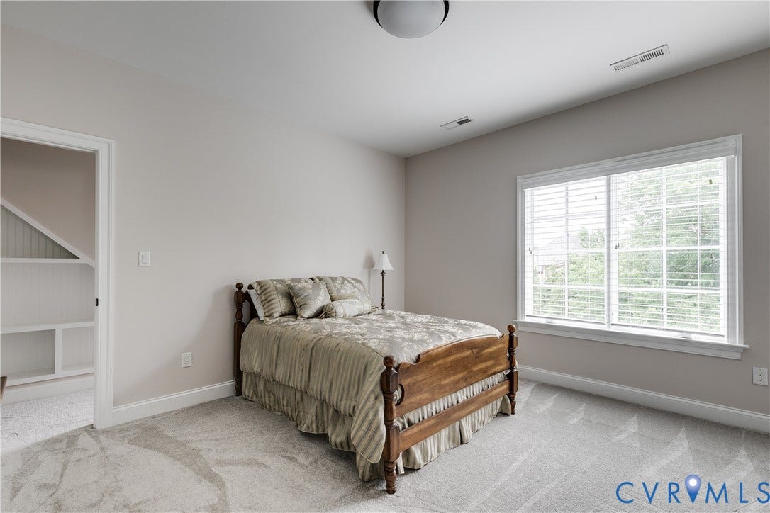 1978 Farnborough Drive, Midlothian, VA 23112 Carpeted room featuring a large window with white blinds, white baseboards, and a flush-mount ceiling light