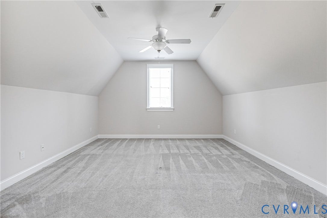 1978 Farnborough Drive, Midlothian, VA 23112 Carpeted room featuring a single window, sloped ceilings, and a ceiling fan