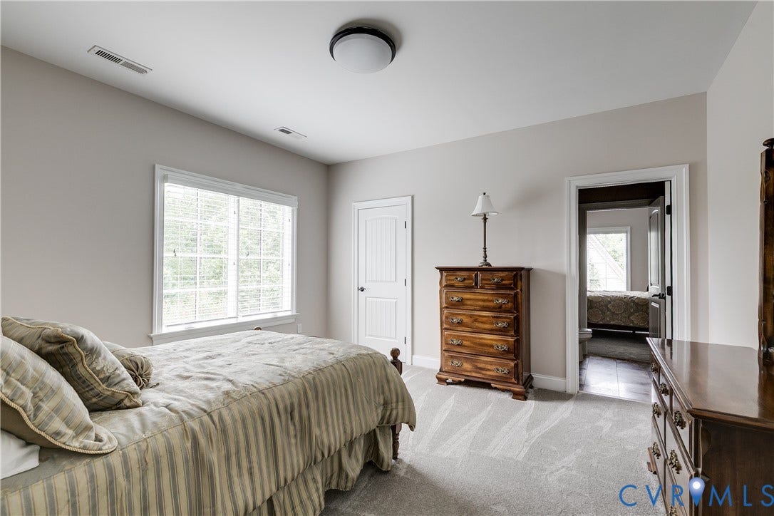 1978 Farnborough Drive, Midlothian, VA 23112 Light-filled interior space with neutral wall tones and a window featuring multiple panes
