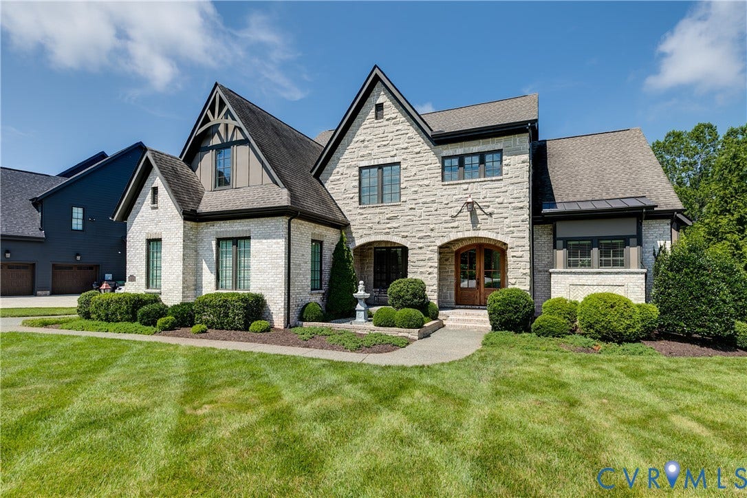 1978 Farnborough Drive, Midlothian, VA 23112 Stone and brick exterior featuring a steep-pitched roofline with gables and dark trim