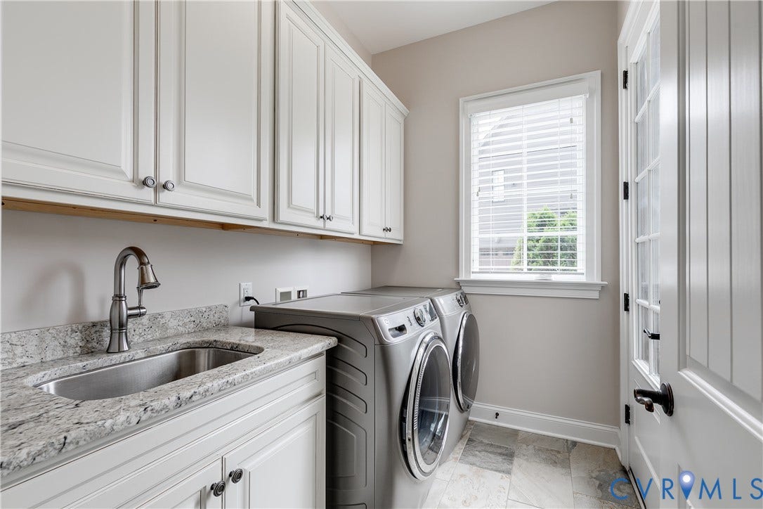 1978 Farnborough Drive, Midlothian, VA 23112 Utility room featuring white cabinetry, a sink with a brushed nickel faucet, light-toned stone-finish countertops, and matching floor tiles