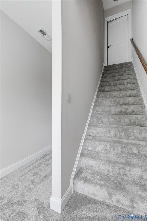 1978 Farnborough Drive, Midlothian, VA 23112 Carpeted staircase with light gray walls, white trim, and a wood handrail