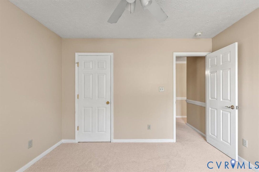 1437 Palmore Road, Powhatan, VA 23139 Spacious room featuring neutral carpeting and light-toned walls