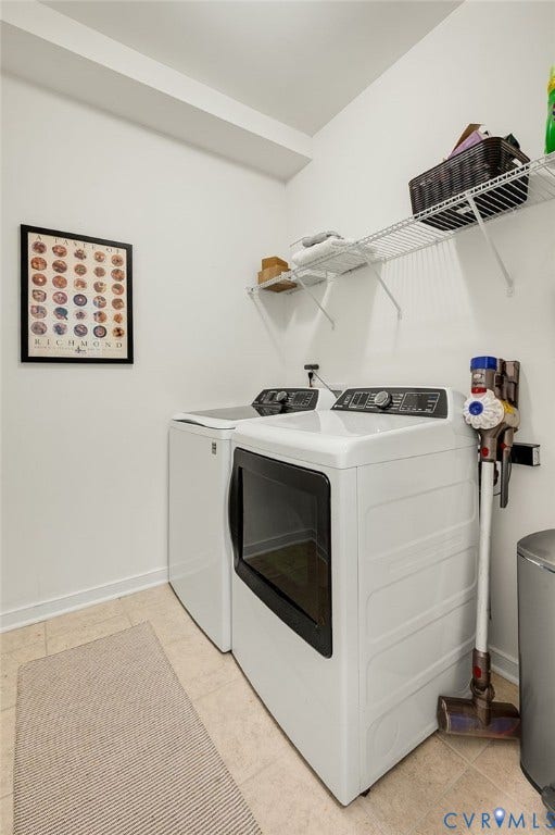 9217 Cerulean Place, Goochland, VA 23238 Laundry area featuring tile flooring, white walls, and an elevated shelf system for storage