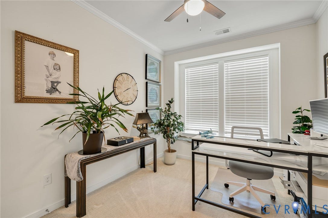 9217 Cerulean Place, Goochland, VA 23238 Bright room featuring a large window, crown molding, and a ceiling fan