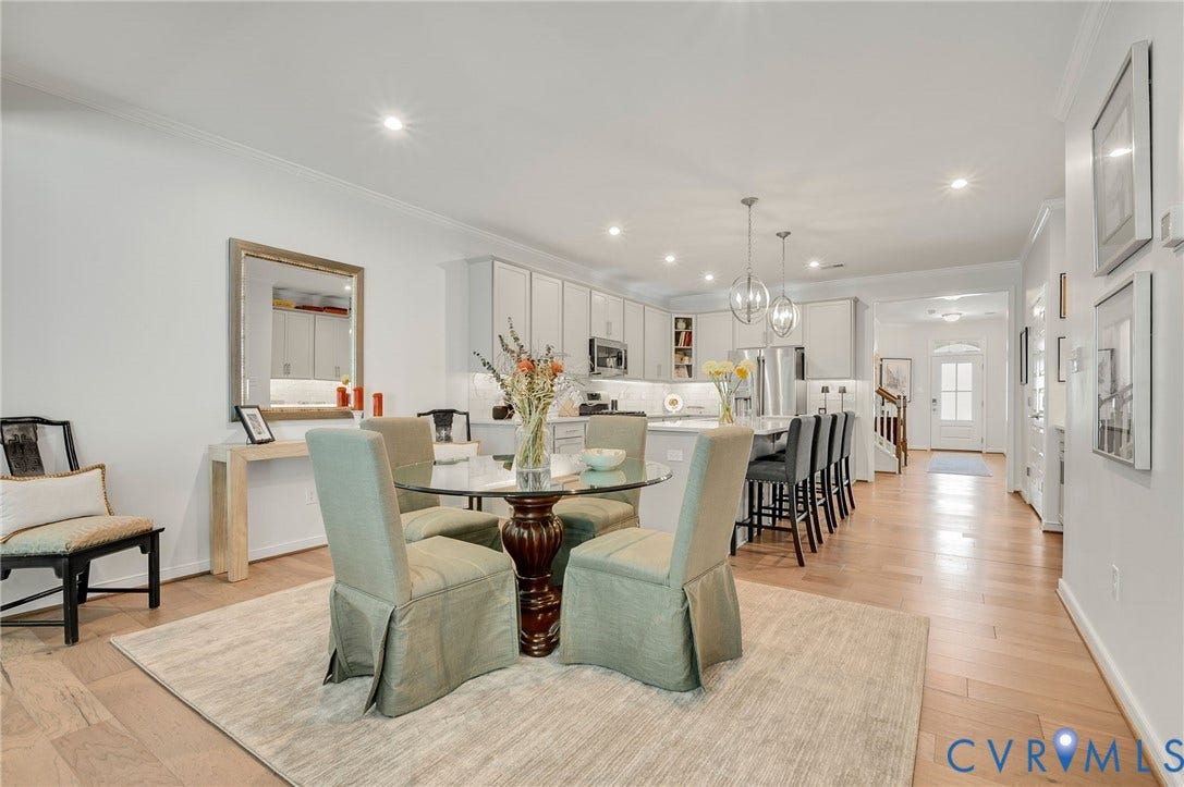 9217 Cerulean Place, Goochland, VA 23238 Expansive open-concept living area featuring light wood-finish flooring and recessed lighting