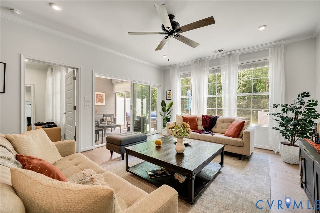 9217 Cerulean Place, Goochland, VA 23238 Bright living area featuring wood-finish flooring, recessed lighting, and a ceiling fan