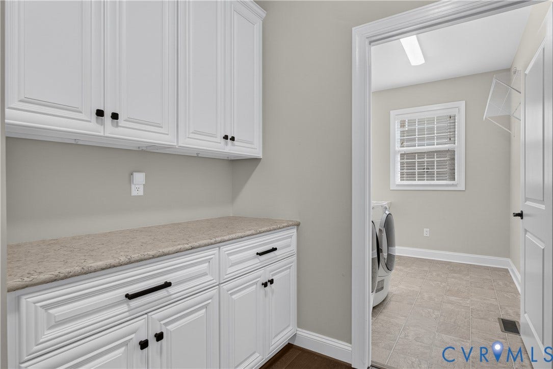 7238 Shenfield Avenue, Minutes To Short Pump, Glen Allen, VA 23059 Laundry area featuring white cabinetry, a light-toned countertop, and tile flooring