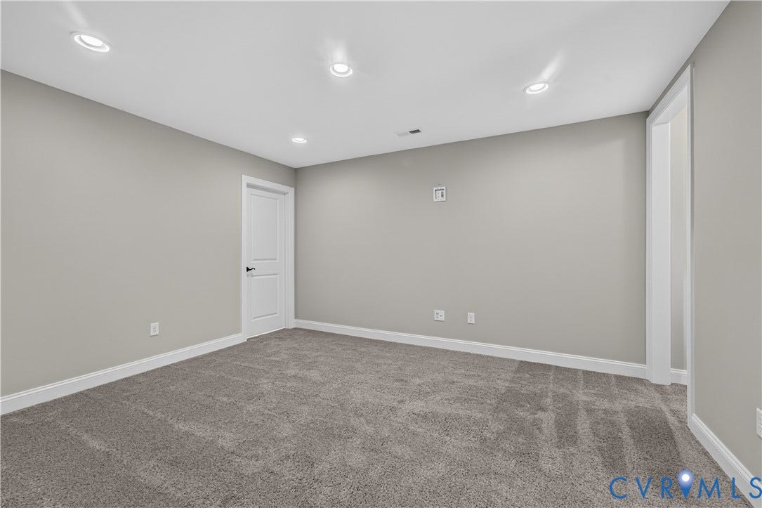 7238 Shenfield Avenue, Minutes To Short Pump, Glen Allen, VA 23059 Spacious room featuring neutral carpeting and light gray wall paint