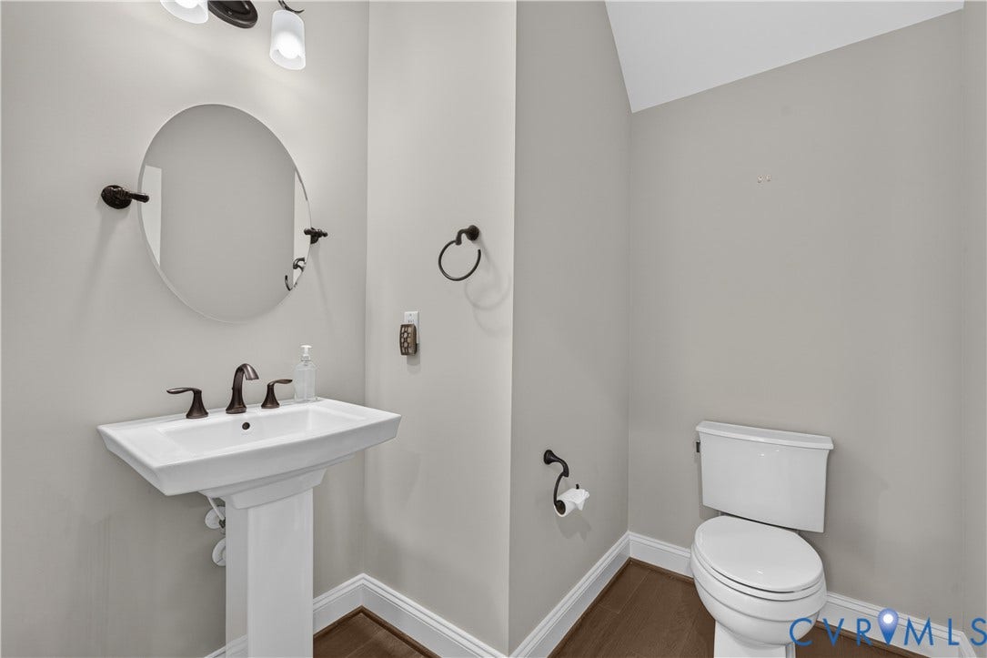 7238 Shenfield Avenue, Minutes To Short Pump, Glen Allen, VA 23059 Pedestal sink with dark bronze hardware and fixtures