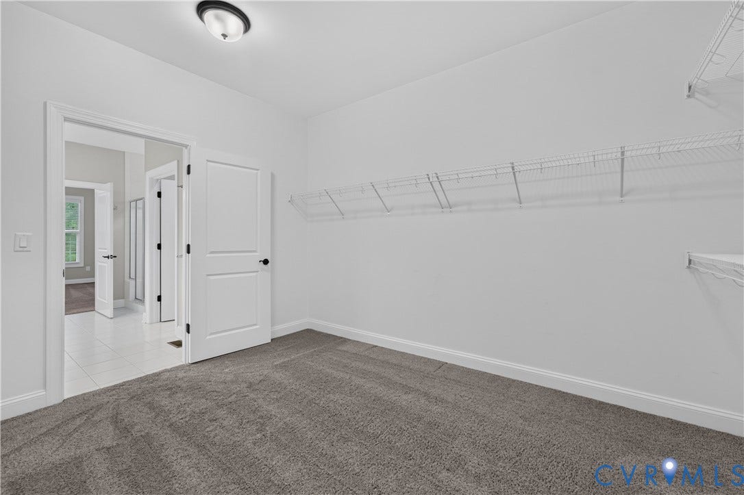 7238 Shenfield Avenue, Minutes To Short Pump, Glen Allen, VA 23059 Neutral wall paint, plush carpeting, white trim, and a semi-flush mount ceiling fixture