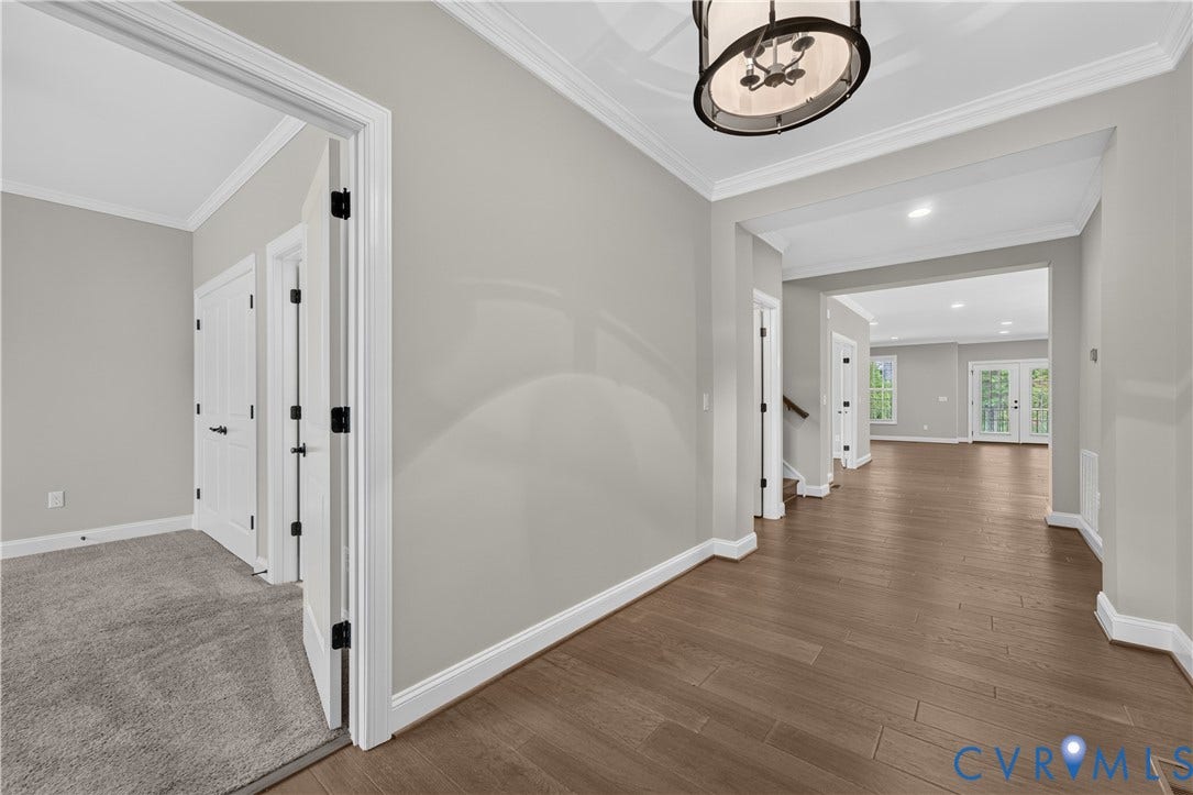 7238 Shenfield Avenue, Minutes To Short Pump, Glen Allen, VA 23059 Entryway featuring wood-finish flooring and crown molding