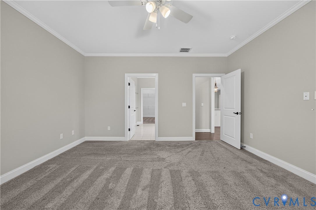 7238 Shenfield Avenue, Minutes To Short Pump, Glen Allen, VA 23059 Spacious carpeted room featuring light gray walls, white crown molding, and a ceiling fan