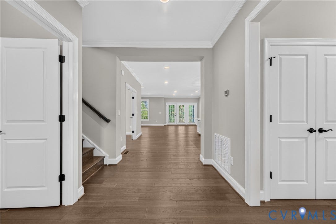 7238 Shenfield Avenue, Minutes To Short Pump, Glen Allen, VA 23059 Spacious foyer featuring wood-finish flooring, light gray wall paint, crisp white trim, and recessed lighting