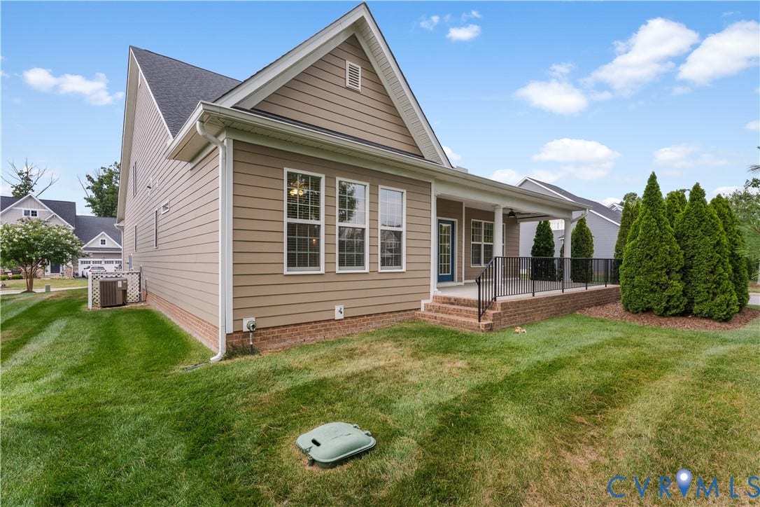 7238 Shenfield Avenue, Minutes To Short Pump, Glen Allen, VA 23059 Rear exterior with a covered patio, featuring a dark blue door and multiple windows
