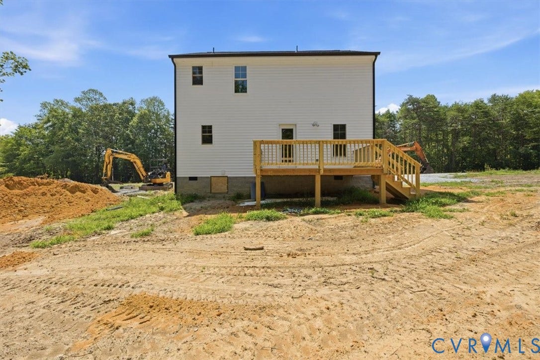 654 Frenchs Store Road, Cumberland, VA 23040 White siding exterior with multiple windows