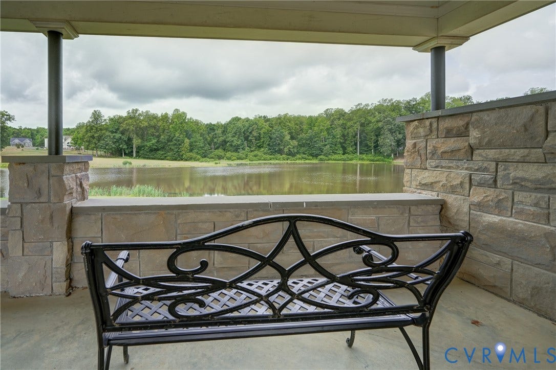 1769 Fishers Pond Drive, Goochland, VA 23102 Seating in the Pavillon overlooking the community lake.