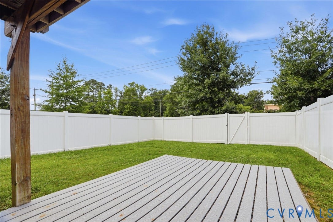 4101 New Hermitage Drive, Henrico, VA 23228 Expansive outdoor patio featuring a composite deck and a large grassy area