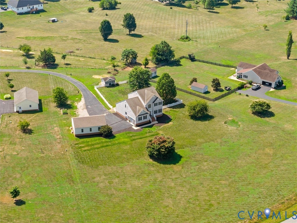 NEW PRICE AND SELLER WILL PAY 10,000 IN CLOSING COST. INCREDIBLE SPACE INSIDE AND OUT. DETACHED GARAGE WITH 2 OFFICES WITH HVAC. LARGE PARCEL. JOIN THE LAKE!
