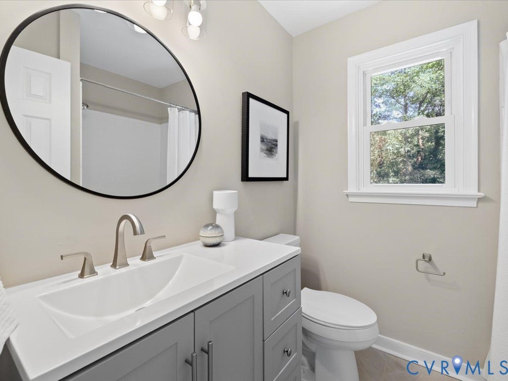 9630 Goneway Drive, Henrico, VA 23238 NEW tile floor, vanity, lighting, fixtures, comfort height toilet, shower fixtures and a BRAND NEW sliding glass door to be installed mid-August!