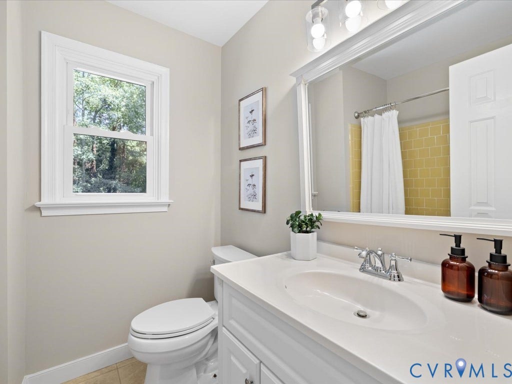 9630 Goneway Drive, Henrico, VA 23238 2nd floor hall bath, tile floor, updated vanity, toilet, light fixture