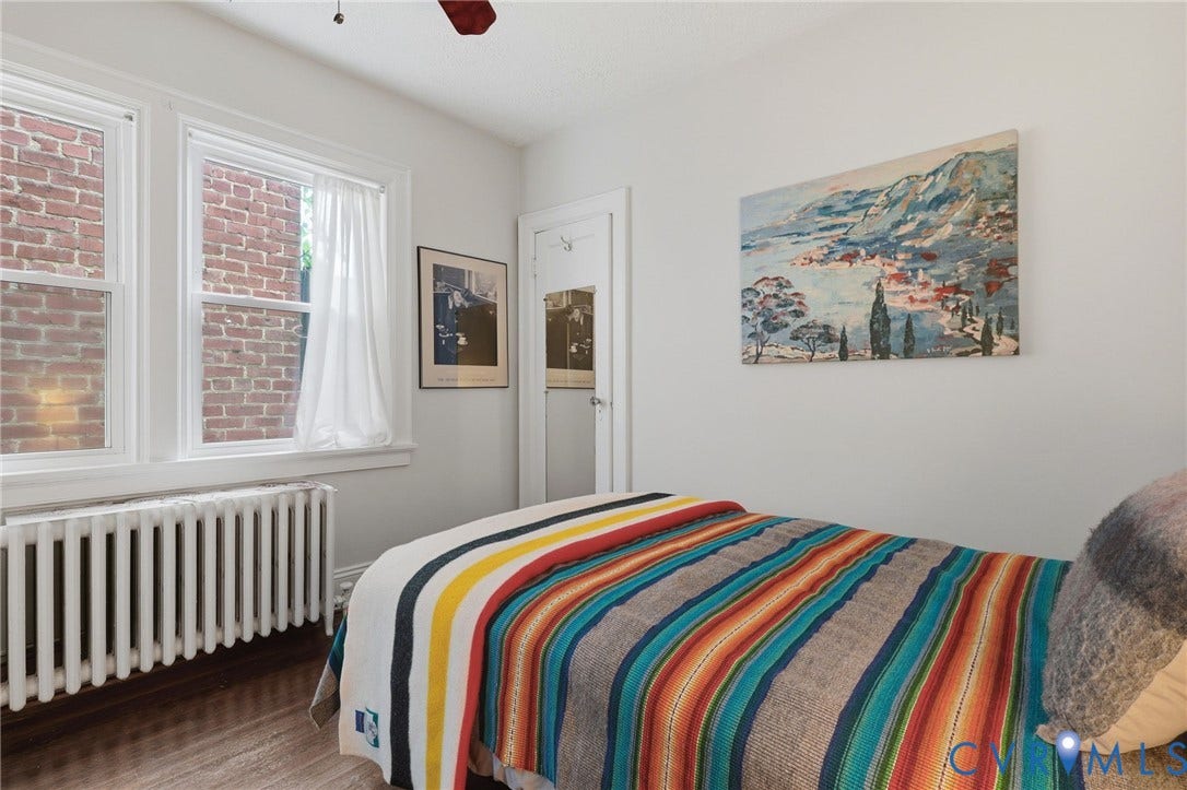 3332 Parkwood Avenue, Carytown, Richmond, VA 23221 Bright room featuring two large windows, white trim, and a classic radiator