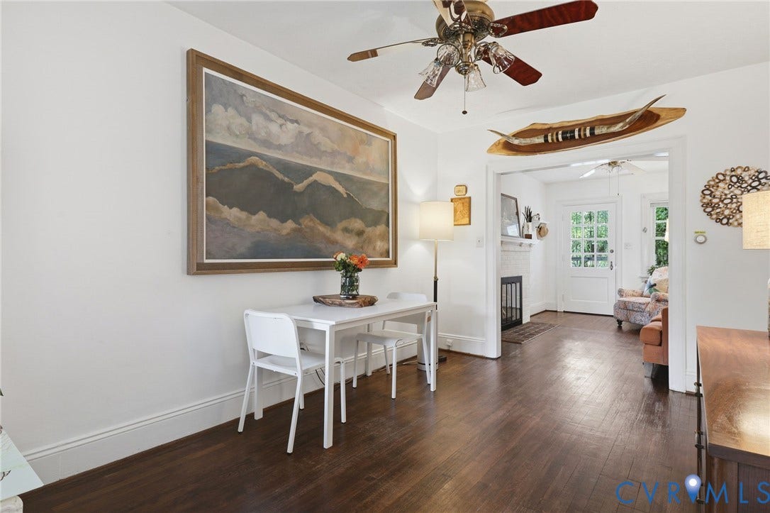 3332 Parkwood Avenue, Carytown, Richmond, VA 23221 Rich wood-finish flooring extends throughout the space, complemented by crisp white baseboards and walls